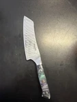 Huusk Damascus Japanese Chef Knife, VG10 Steel Santoku, Ergonomic Handle Open. Price: $50.00.