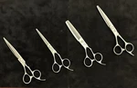 Lot Of 4 Left Handed Hattori Hanzo Shears Used. Price: $1400.00.