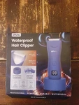 New, Rechargeable Blue Enssu Waterproof Hair Clippers W/led Light. Price: $20.59.