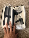 Stainless Steel Hair Cutting Scissors Set With Finger Rest, Combs, Case, 6IN New. Price: $20.00.