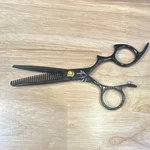 Sharkfin Thinning Hair Shears Black Japanese Steel Adjustable Tension, Rest Used. Price: $100.00.