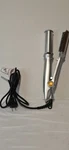 Tre Milano Rotating Curling Iron Silver IS1001 Electric Hair Styling Tool Used. Price: $25.00.