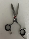 Chi Professional 6" Thinning Shears Used. Price: $129.00.