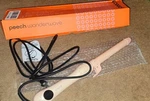 Peech Wonderwave Self Curling Iron New. Price: $75.00.