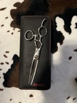 Above LCGQ-6325WN Thinning Shears (left-handed) Used. Price: $175.99.